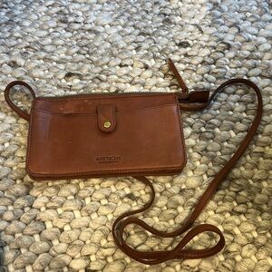 American Leather Co. cross body clutch. Genuine leather